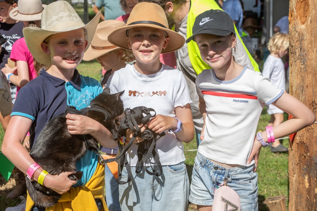 Three children with their pets