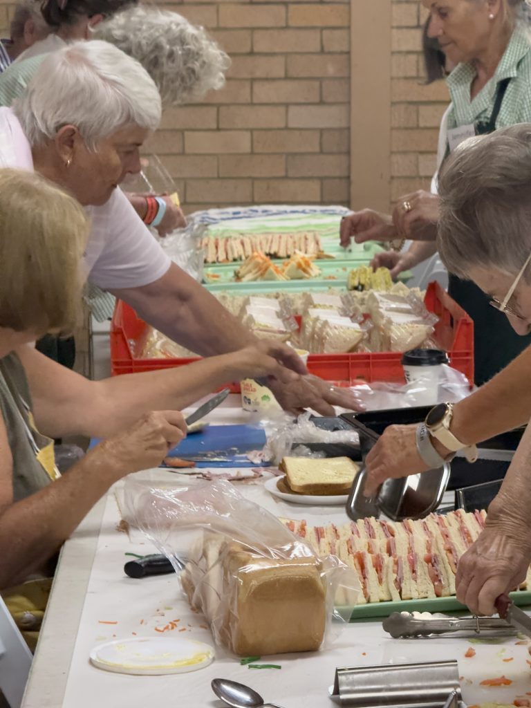 Volunteers making sandwiches