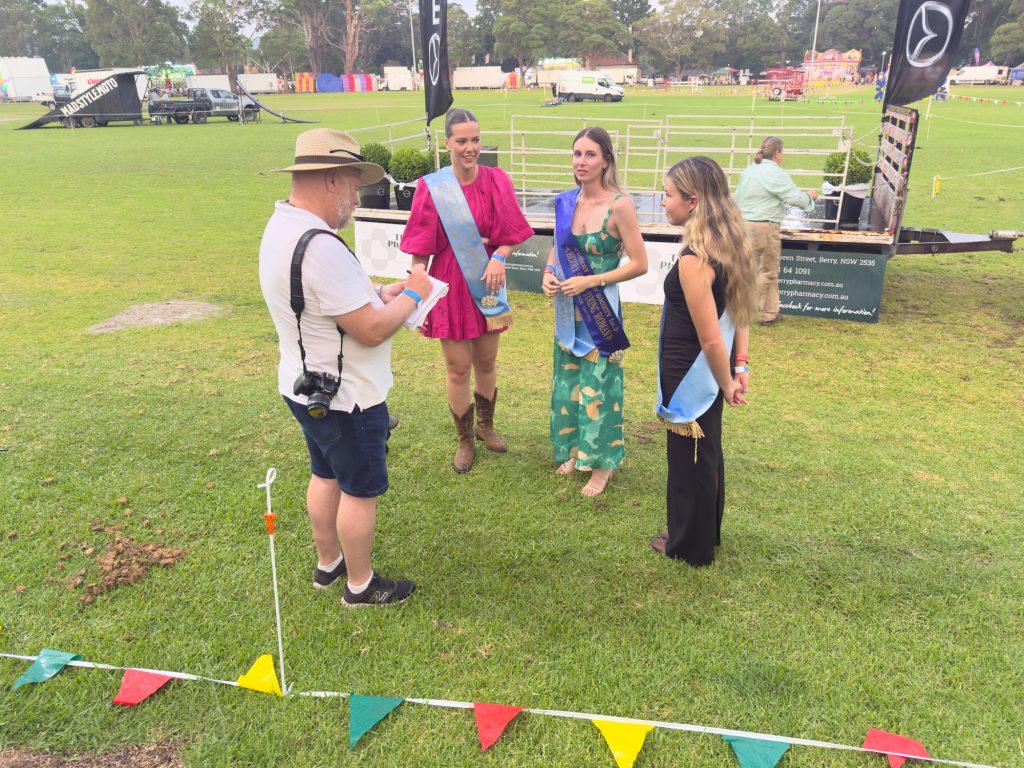 Young Woman entrants in their sashes on the lawn