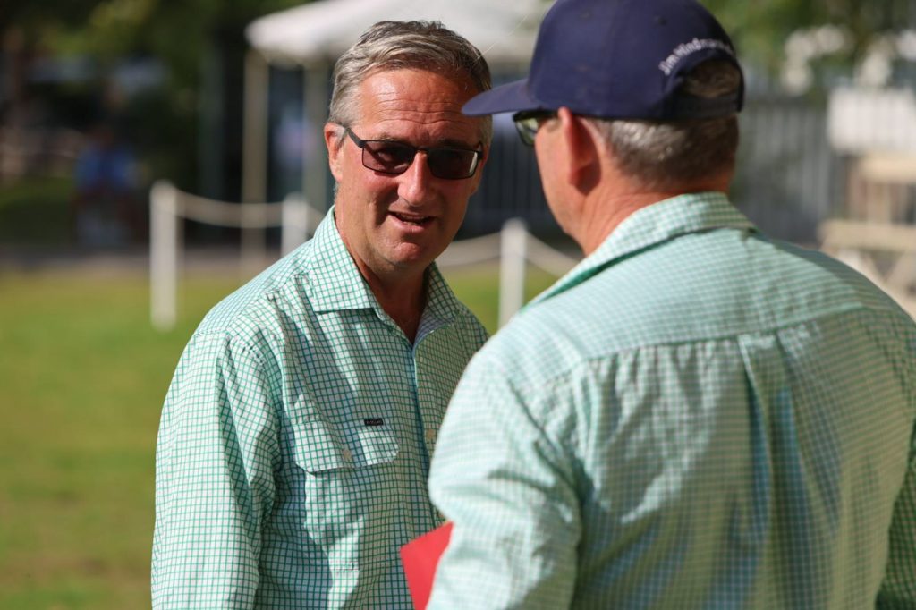Two committee members in conversation