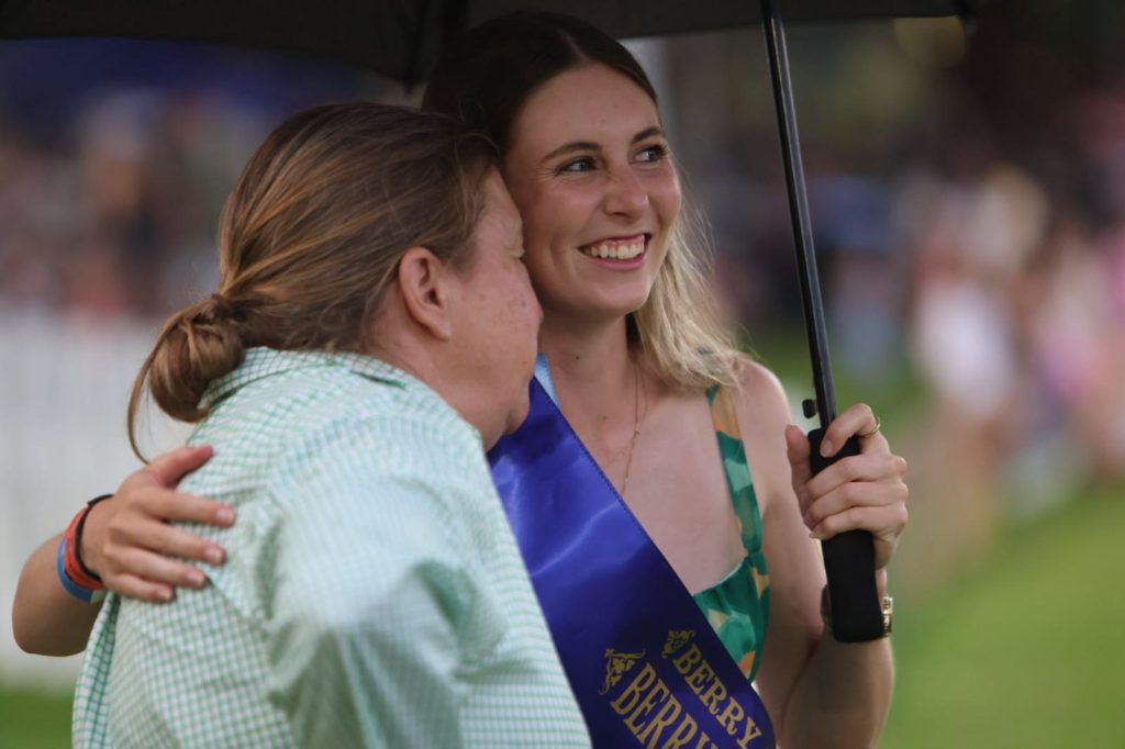 A Young Woman entrant getting a hug