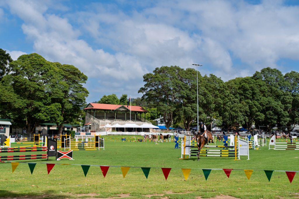 The showjumping ring under a big summer sky