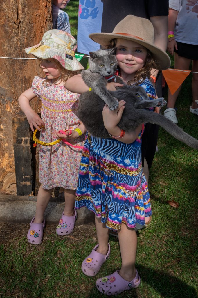 Two girls with their cat at the Pet Show