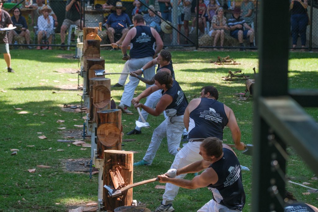 Competitors racing in the sawing event