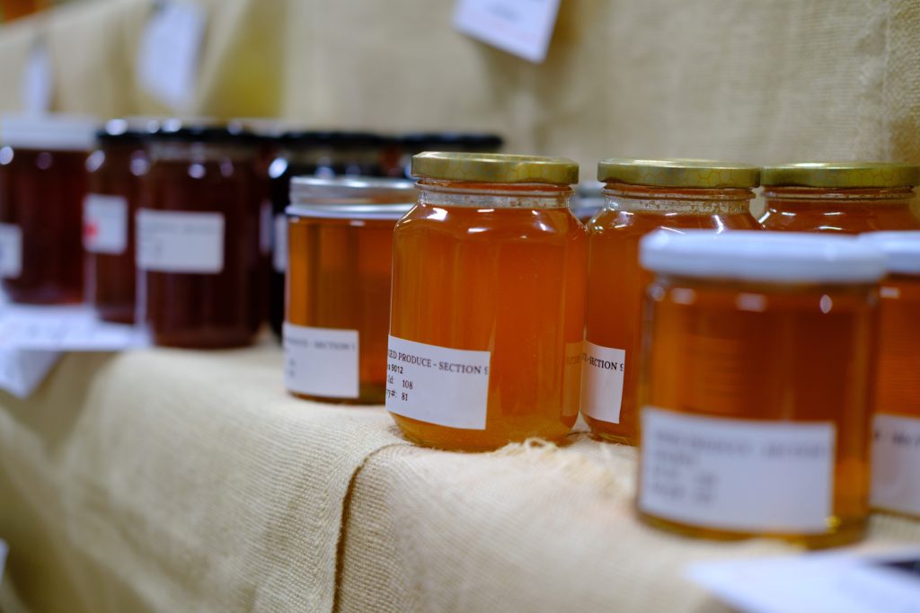 Jars of honey and preserves on show
